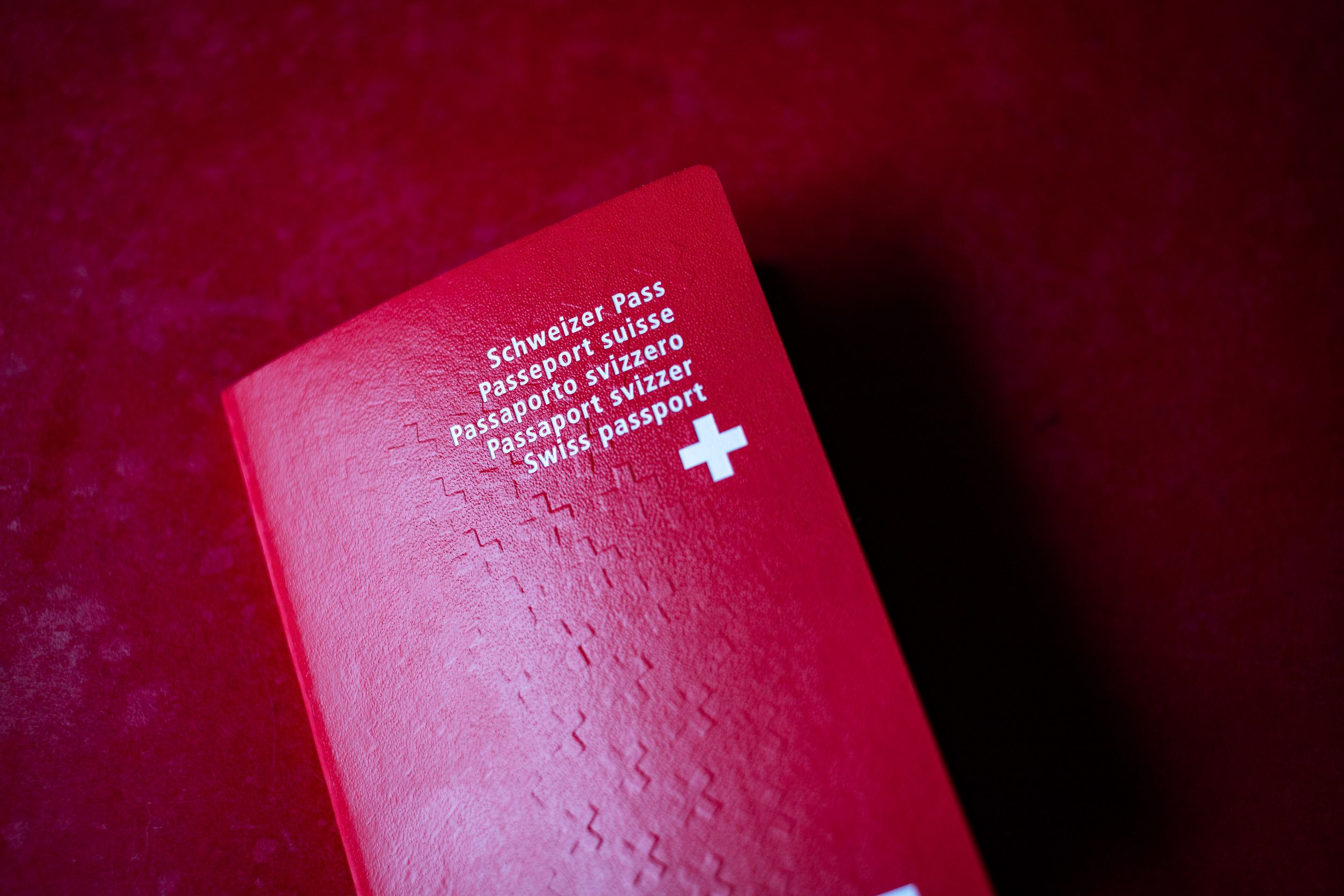 Swiss passport on red background